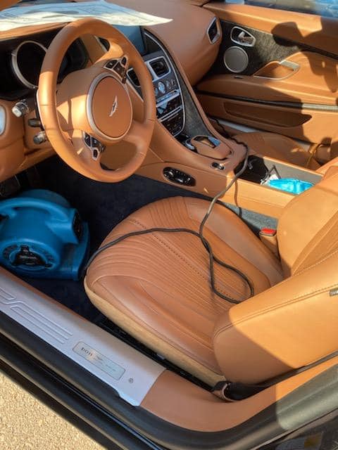 Aston Martin DB11 interior being professionally detailed
