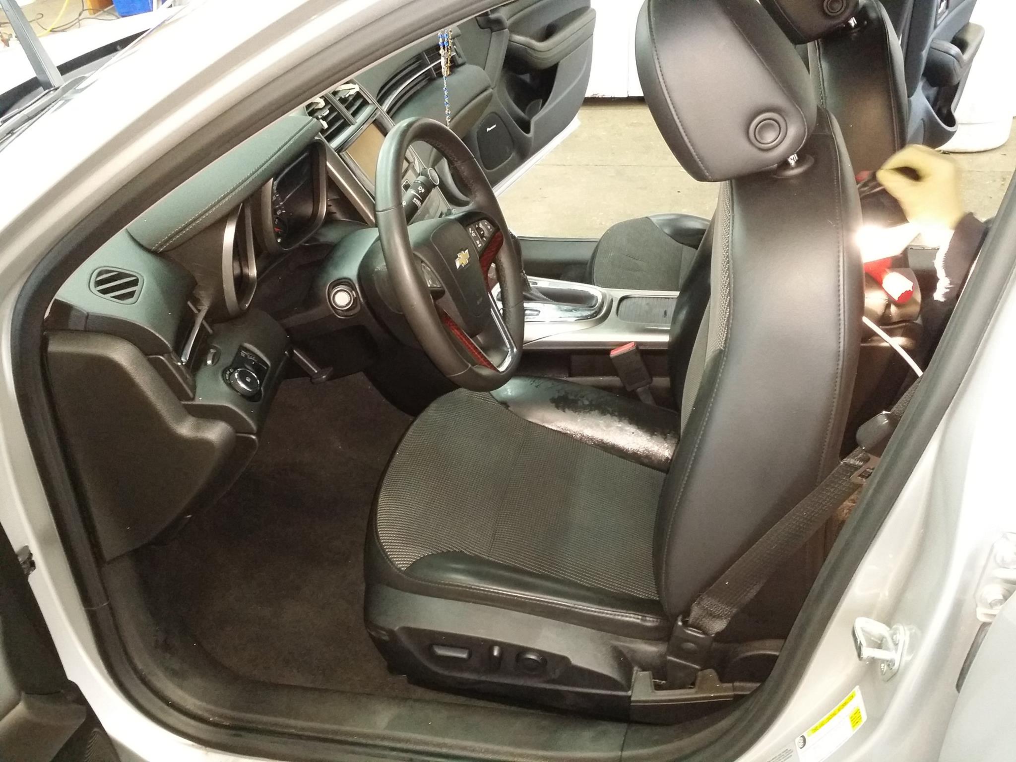 Camaro interior after detailing — clean leather seats