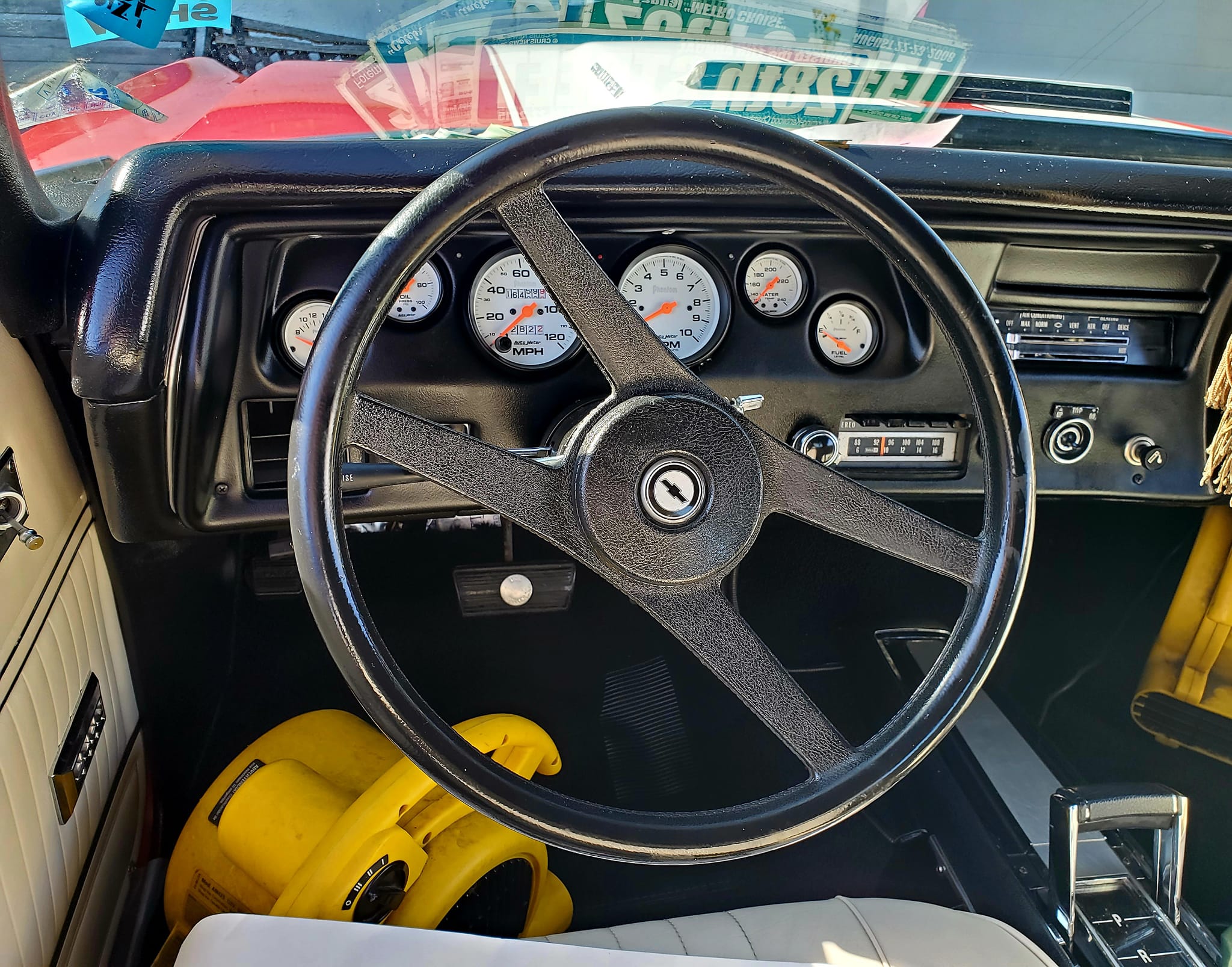 Classic muscle car gauges and steering wheel after detailing