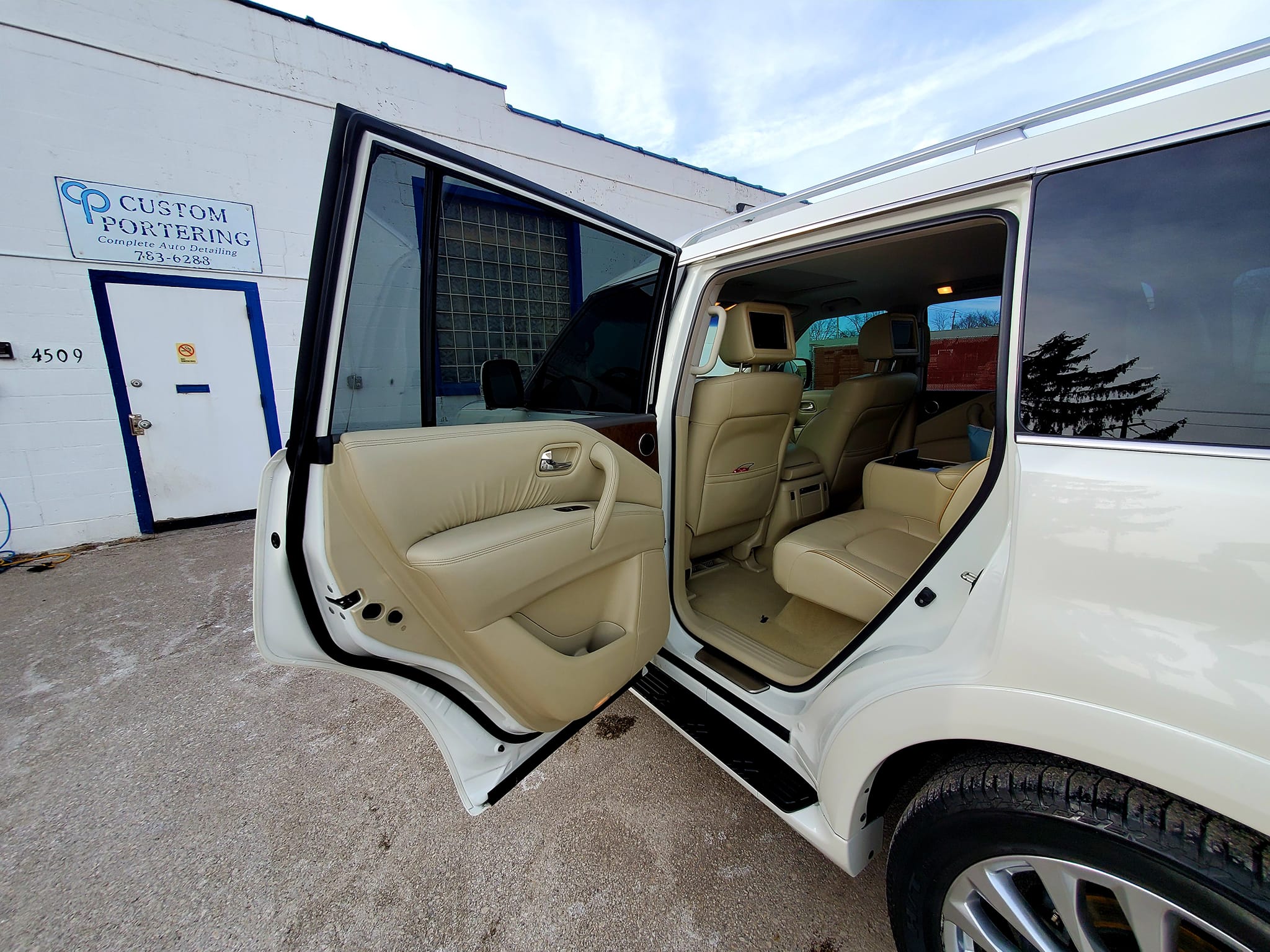 Infiniti QX80 door open after detailing