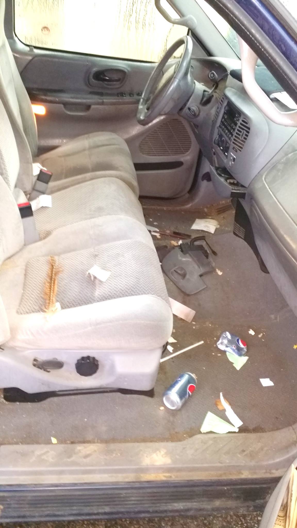 Truck interior before detailing — dirty cab